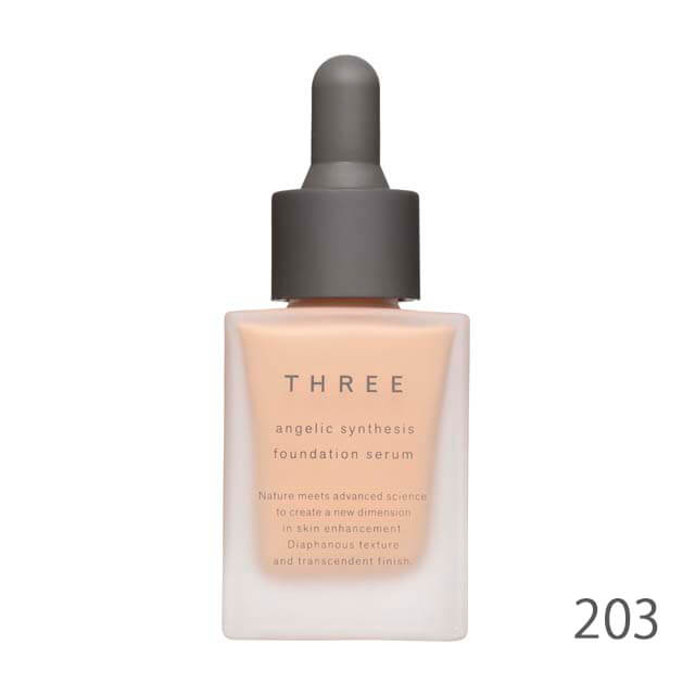 Three Three Angelic Synthesis Foundation Serum Synthesis Foundation Serum  #203 30 ml. ฟาวเดชั่นรูปแบบเซรั่ม มอบผิวชุ่มชื้นดุจสกินแคร์ชั้นเลิศ ให้ผิวโกลว์ดูสุขภาพดี  เนื้อบางเบา เกลี่ยง่าย เผยผิวกระจ่างใส เงางาม